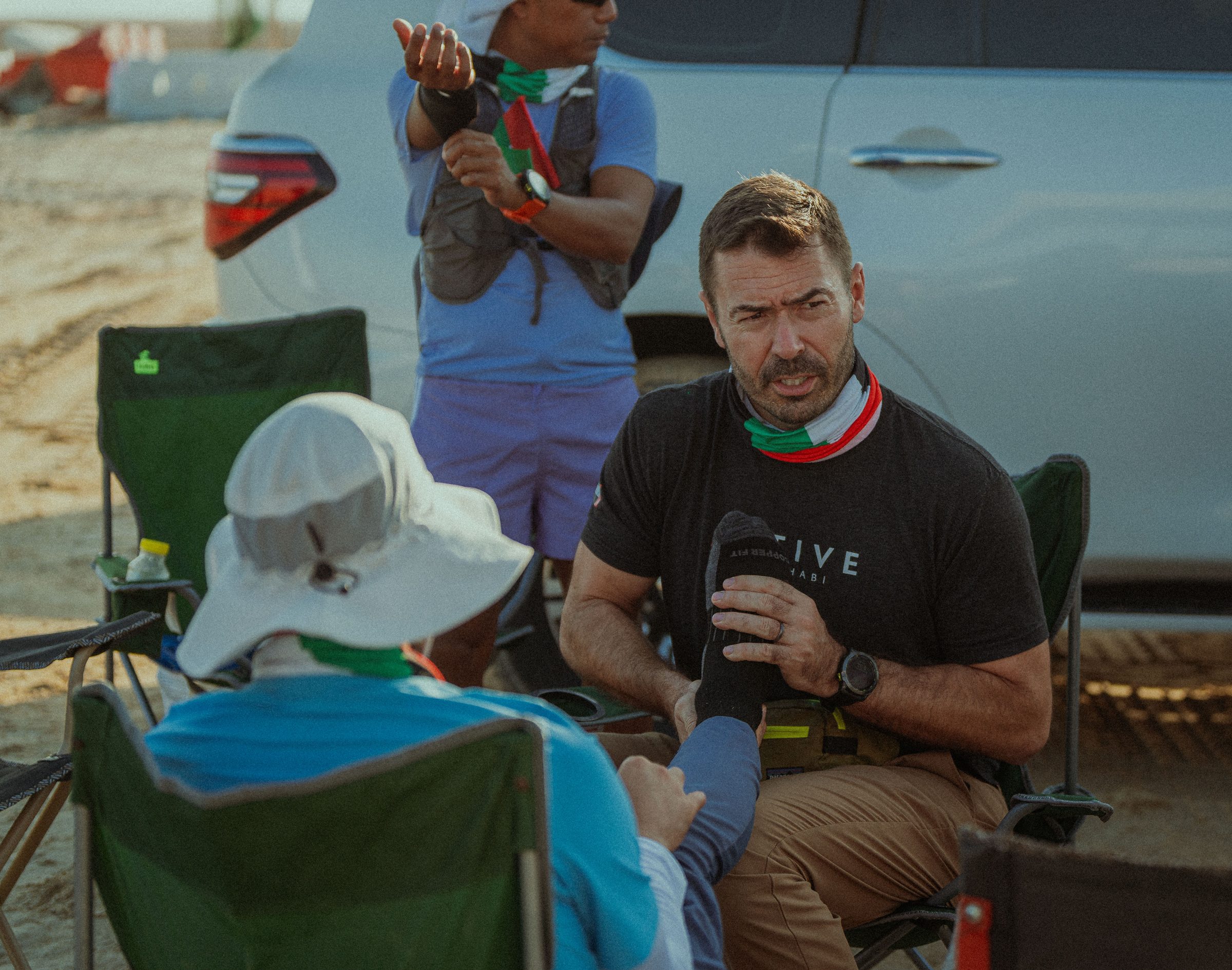 Paul coaching a Walk1000 participant in the desert