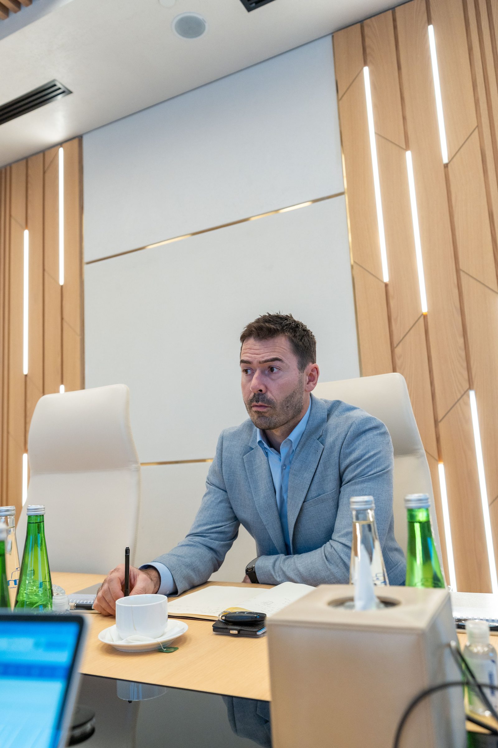 Paul working with a client in a boardroom