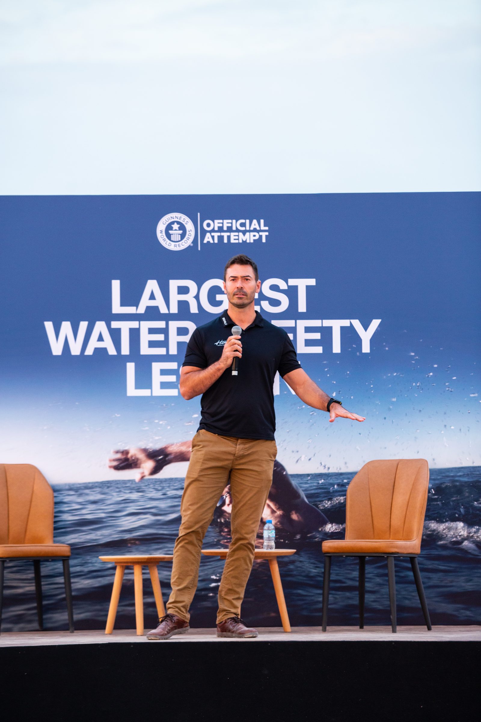 Paul speaking on stage